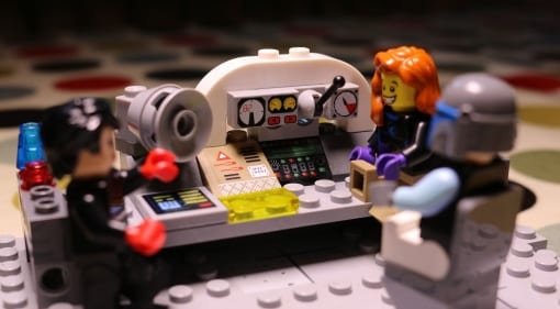 A recreation of the console and "hooter" of the original Electronic Computer MarkII. Turing is shown on the left.